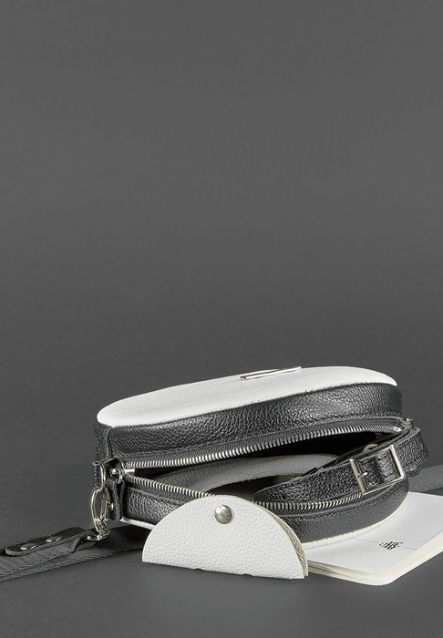 Stylish Round Leather Bag for Women with Decorative Tassel