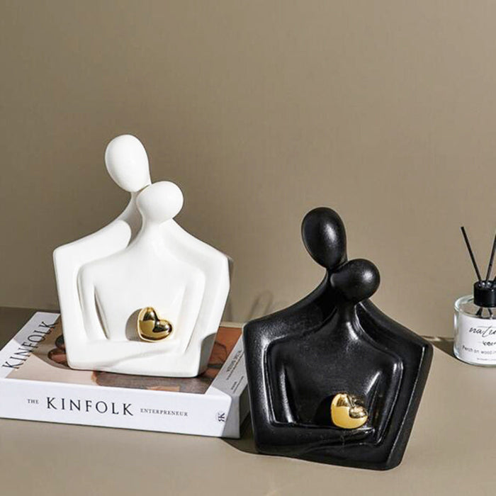 Elegant Ceramic Lovers Sculpture with Golden Heart
