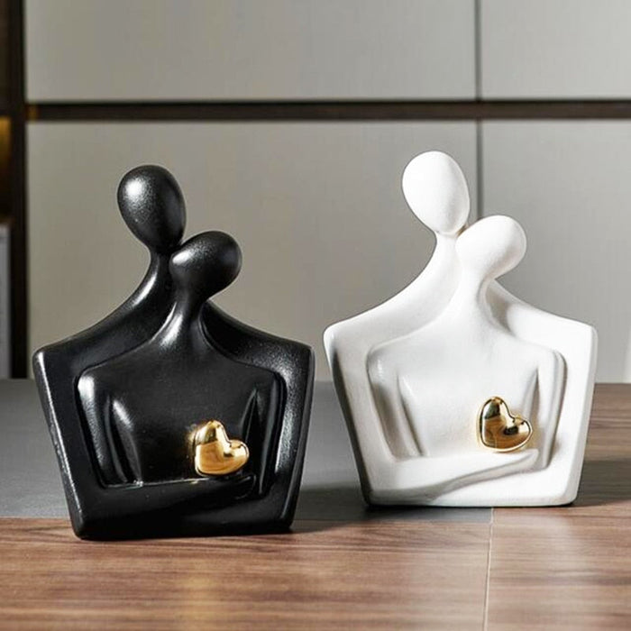 Elegant Ceramic Lovers Sculpture with Golden Heart