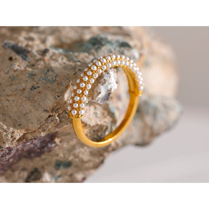 Elegant Golden Ring with Small Pearls