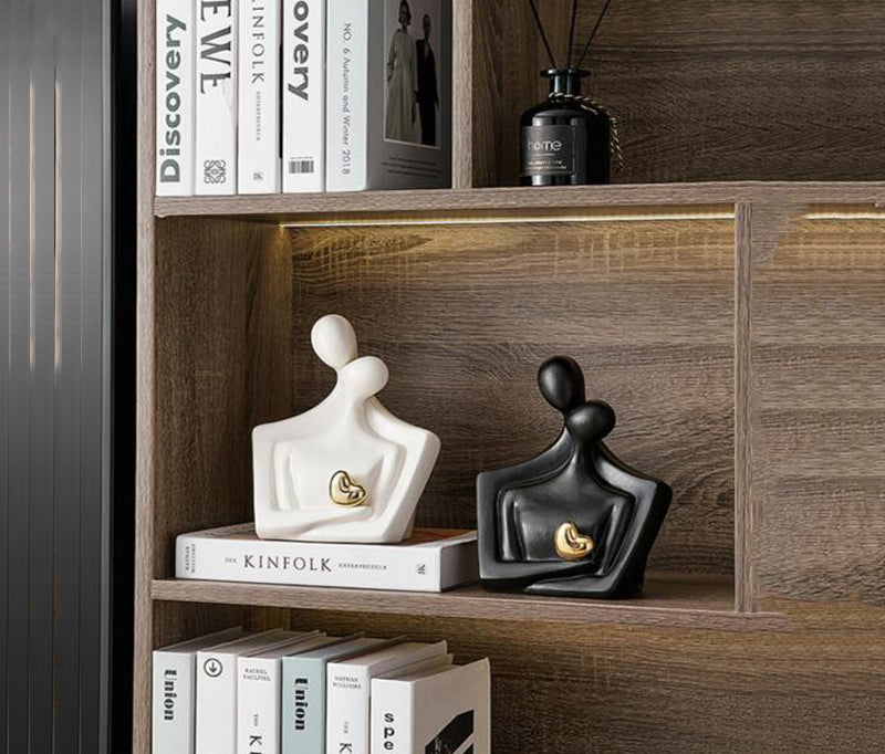 Elegant Ceramic Lovers Sculpture with Golden Heart