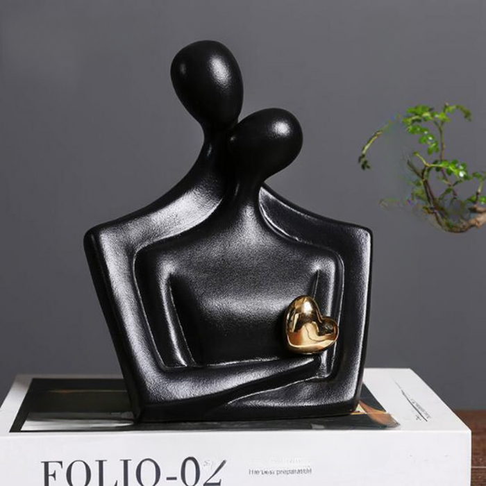 Elegant Ceramic Lovers Sculpture with Golden Heart
