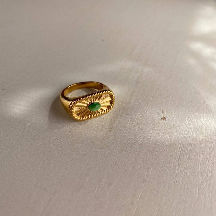 Designer Golden Ring with Green Crystal