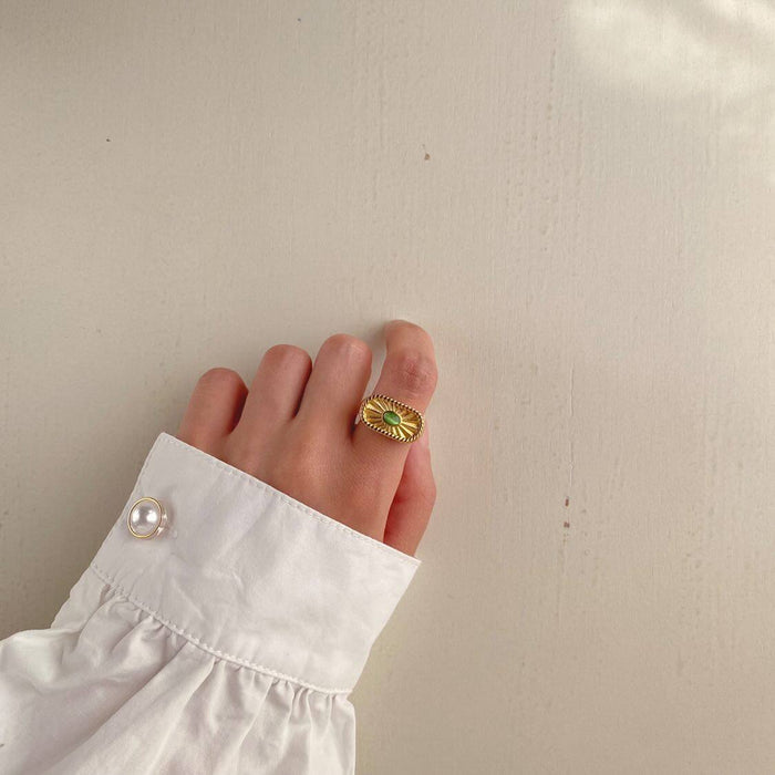 Designer Golden Ring with Green Crystal