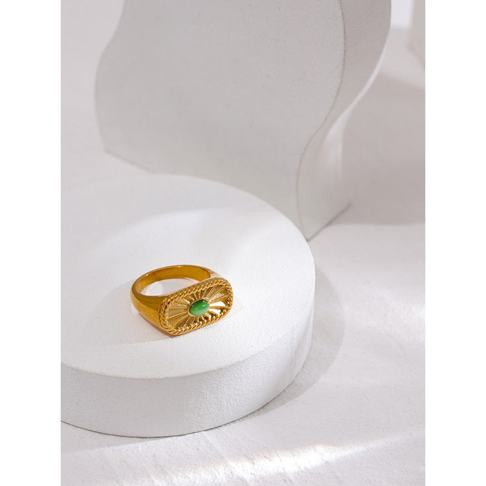 Designer Golden Ring with Green Crystal