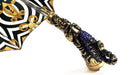 Opulent umbrella with golden scorpion and crystals