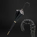 black umbrella with exclusive snake print interior and ruched leather handle
