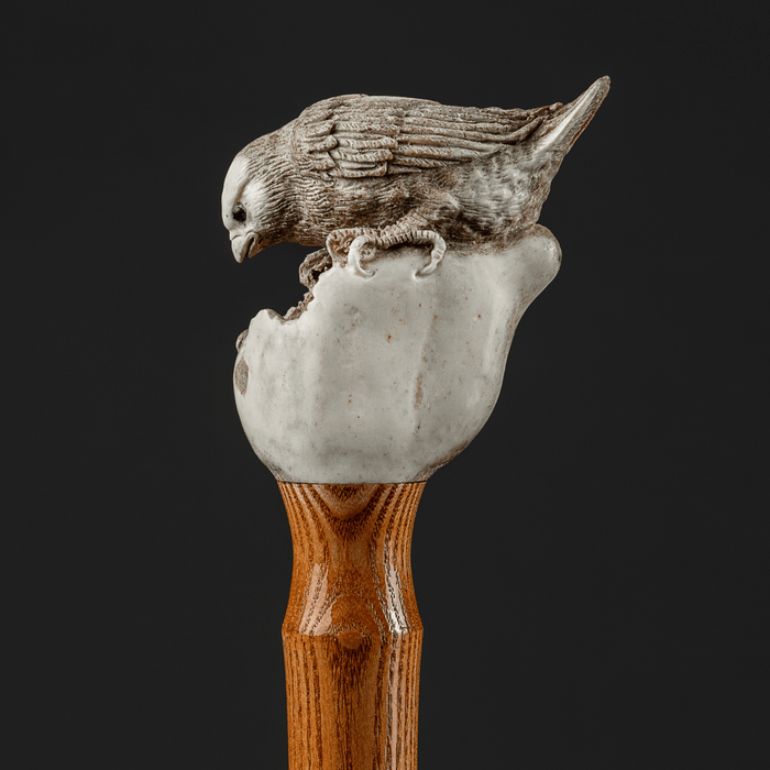 Antique walking stick embellished with bird on a pear motif