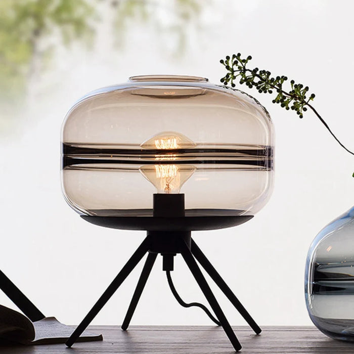 Sleek Tripod Base Glass Table Lamp with Contemporary Design