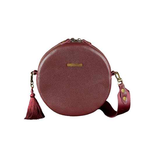 Unique round leather bag with tassel