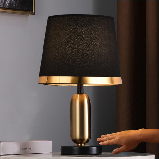 Bold and Contemporary Golden Lamp with a Sleek Design