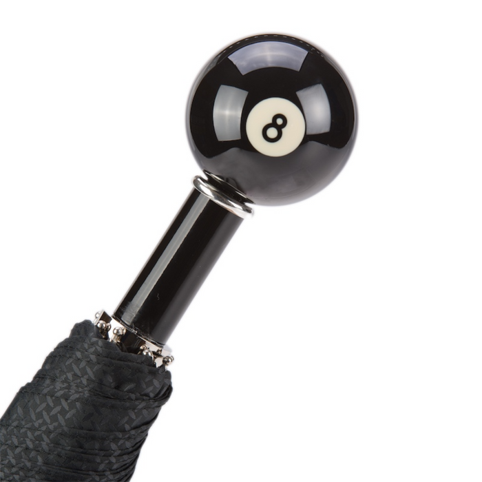 black folding umbrella with 8-ball handle