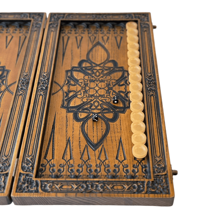 Wooden backgammon board featuring compass motif