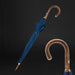 blue umbrella with chestnut wood handle