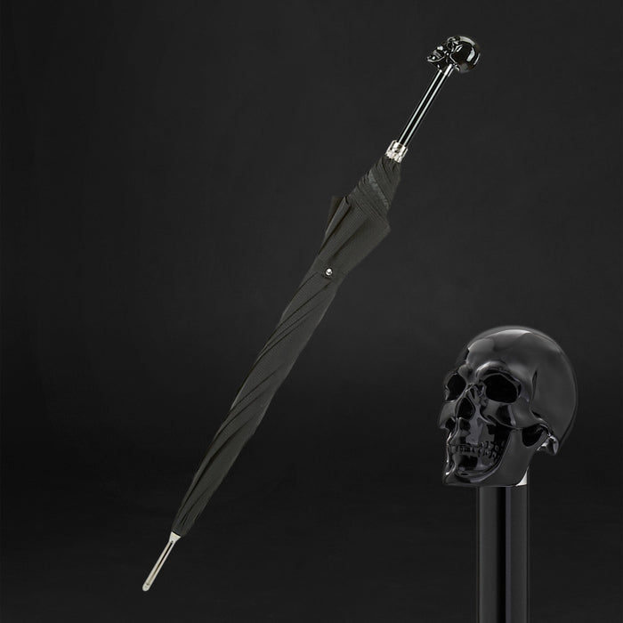 black umbrella with black skull handle