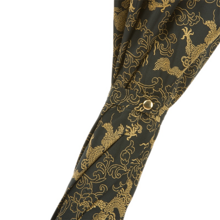 elegant umbrella with golden dragon handle