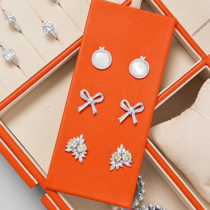 Orange tray for organizing jewelry