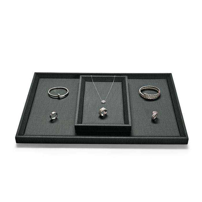 Flat jewelry display tray in dark green PU leather