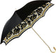 Haute designer umbrella crafted from sumptuous velvet fabric and ornate gold hardware