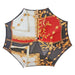 Artisanal designer umbrella featuring hand-carved wooden handle and hand-stitched seams