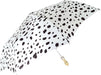 Stylish white umbrellas with spotted design