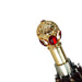 Elegant walking cane with red stone crown handle