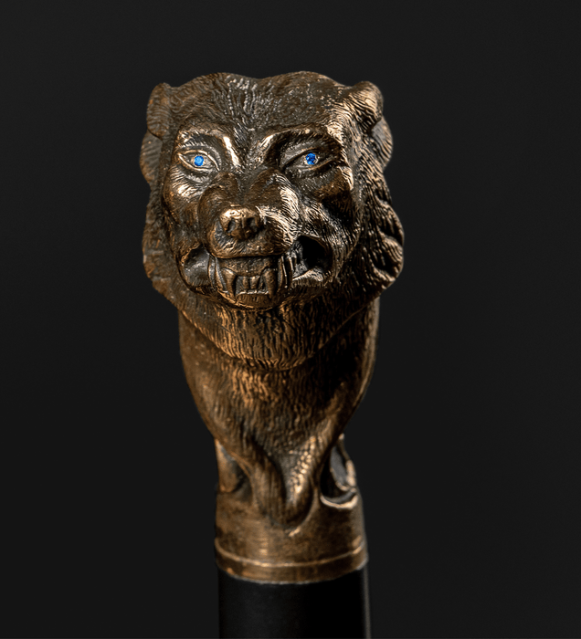 Artisan walking cane featuring wolf and blue eyes