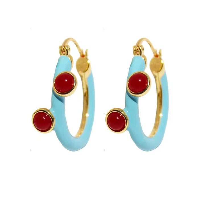 Boucles d'oreilles chics avec cristaux rouges