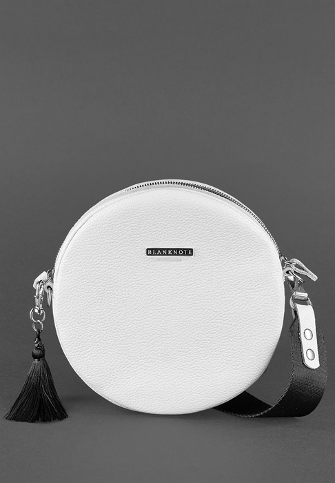 Stylish round leather bag with tassel