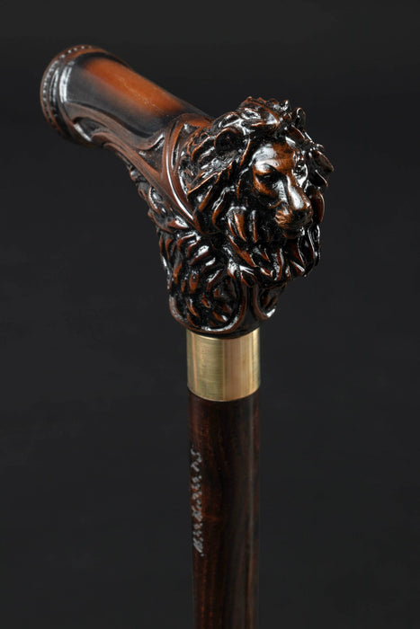 Unusual crazy stick featuring lion head carving