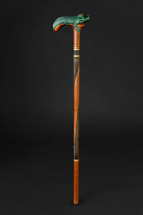 Wooden walking stick with alligator handle