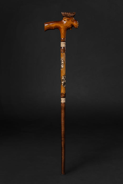 Old-fashioned walking sticks with elk motif