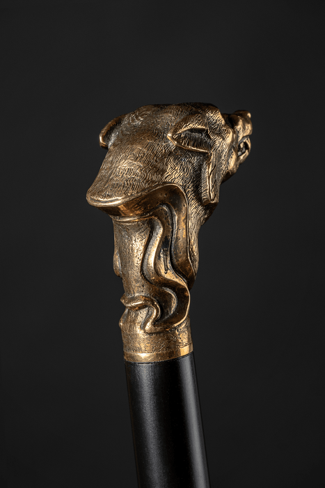 Exclusive walking cane featuring intricately designed wolf and striking blue eyes