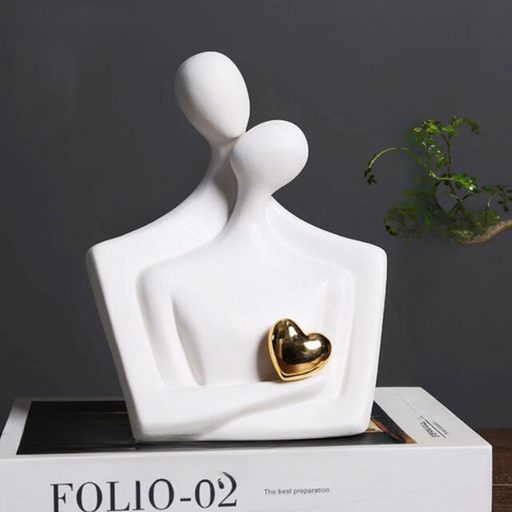 Elegant Ceramic Lovers Sculpture with Golden Heart