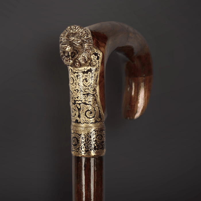 Mahogany walking stick with lion handle