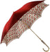 Elegant umbrella adorned with small red roses