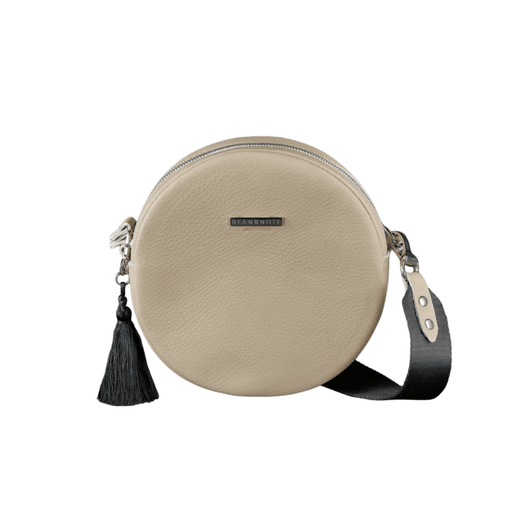 Chic Round Leather Bag for Women with Decorative Tassel