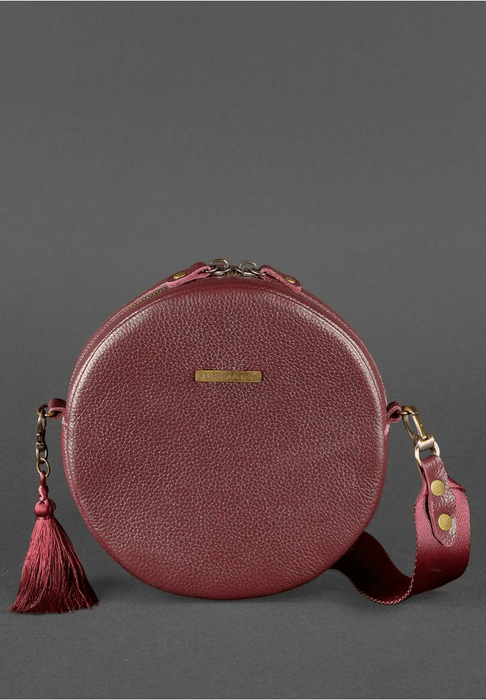 Chic Round Leather Bag for Women with Decorative Tassel