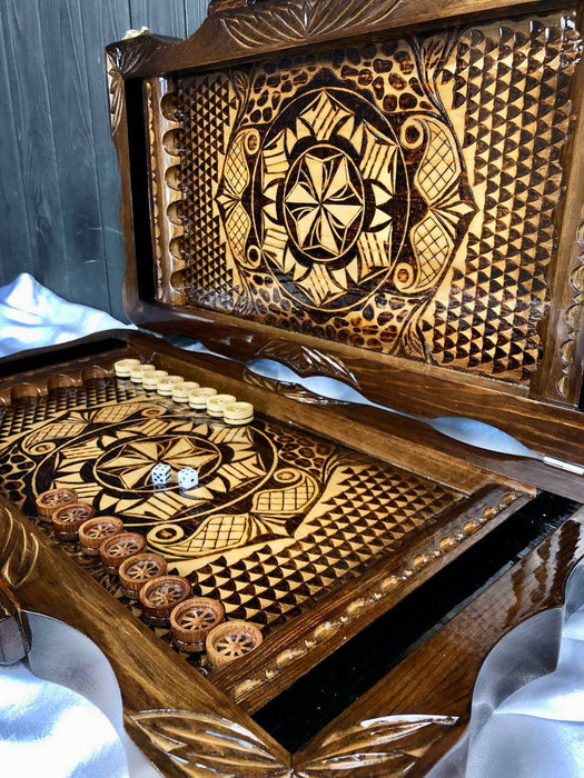 Artistic backgammon set with hand-carved motifs
