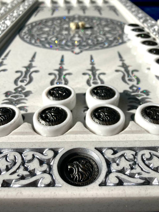 Artistic white acrylic stone backgammon set with carved lion imagery