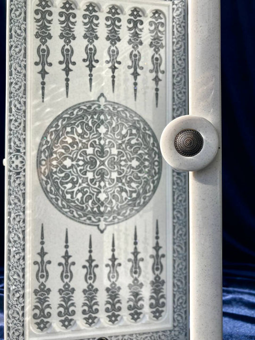 White acrylic stone backgammon set with carved lion motif, luxury design