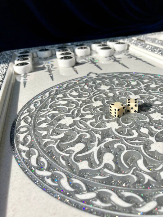 White acrylic stone backgammon board featuring carved lion pattern